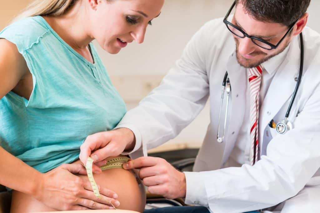 Obstetrician and Gynaecologist with pregnant woman